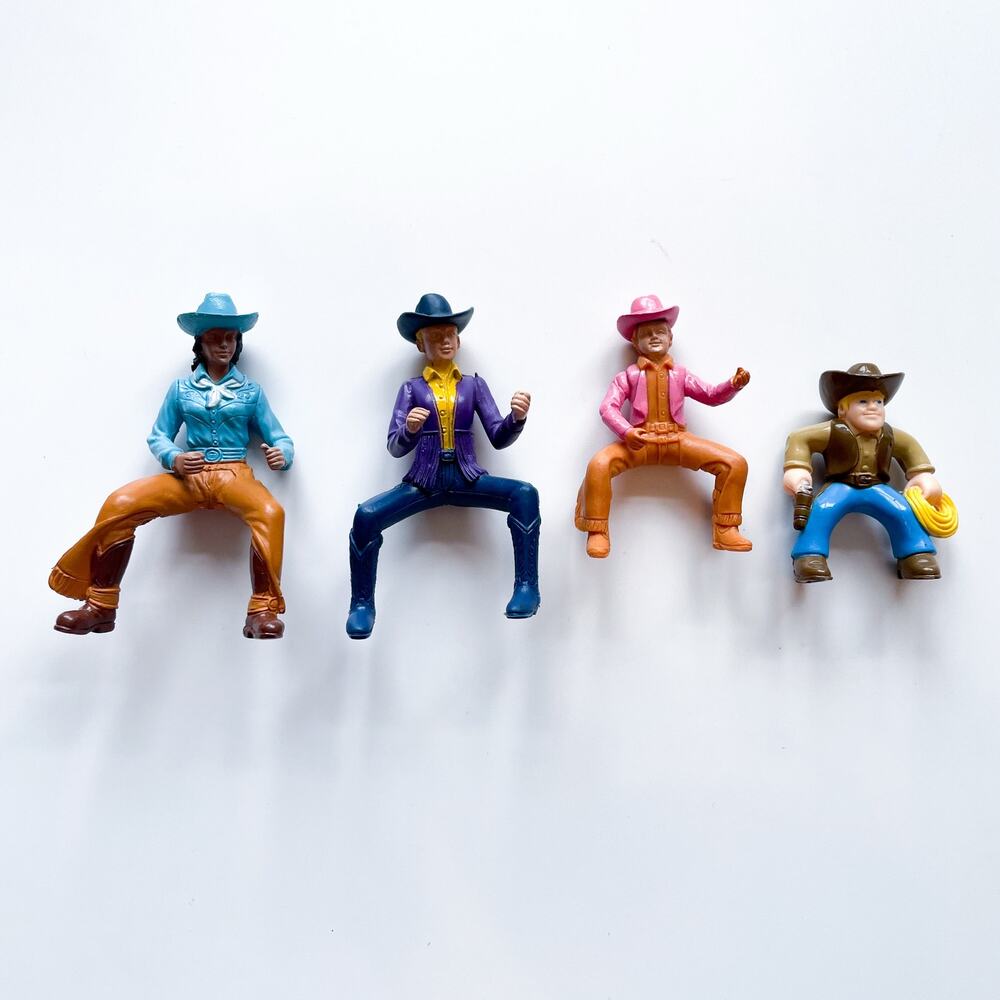 Lot of Four Cowgirls and Cowboy Horseback Riding Equestrian Figures